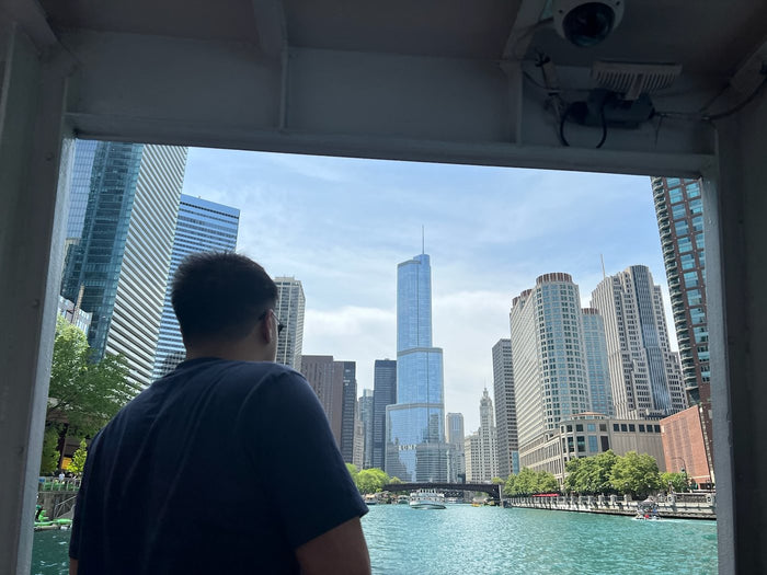 Aaron Gadiano on a boat on the Chicago River