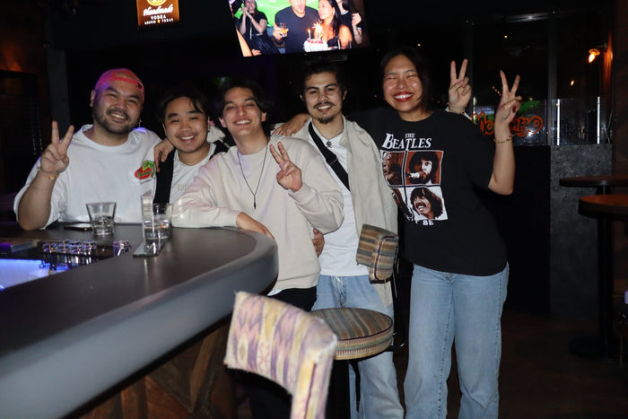 The Audens team out together at a bar